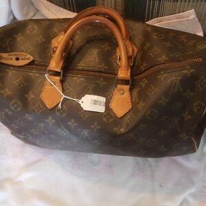 Louis Vuitton Brown Monogram Travel Bag